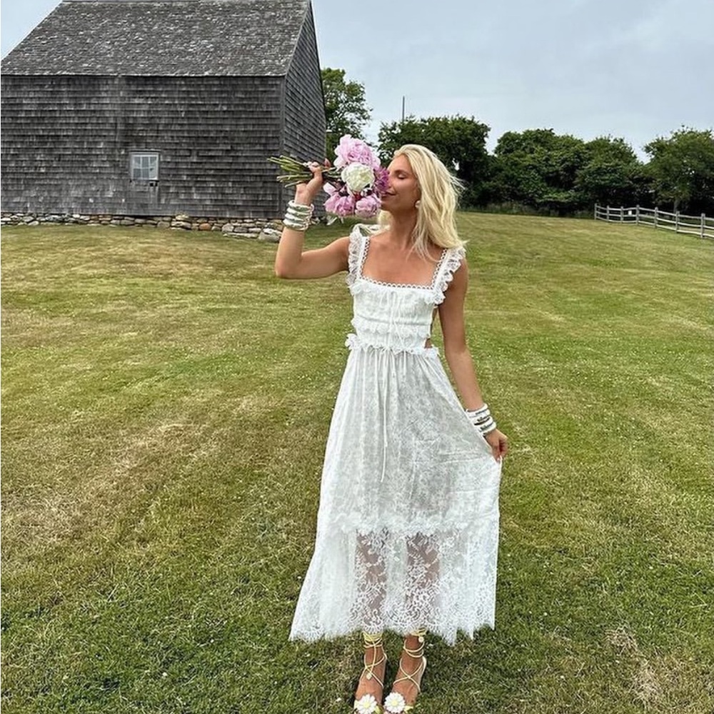 For love & lemons deane midi dress in white brand new with tags!! Size small